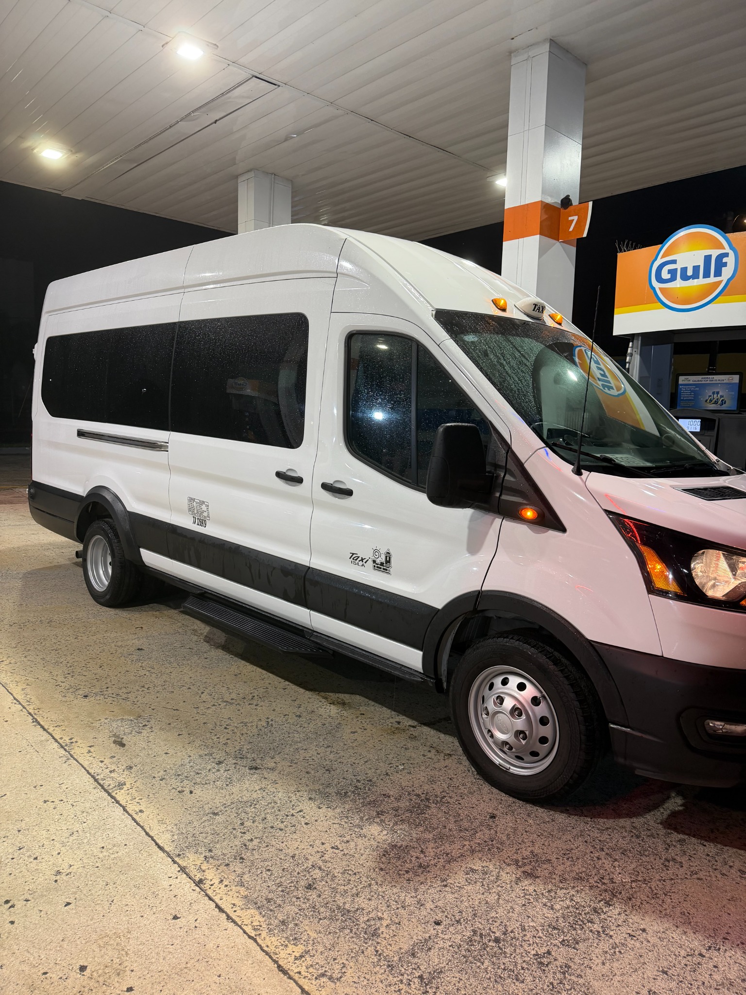 Ray Gonzalez’s white Ford Transit passenger taxi van
